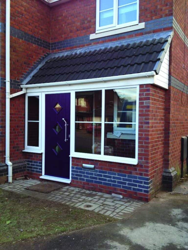 New front porch with aubergine door
