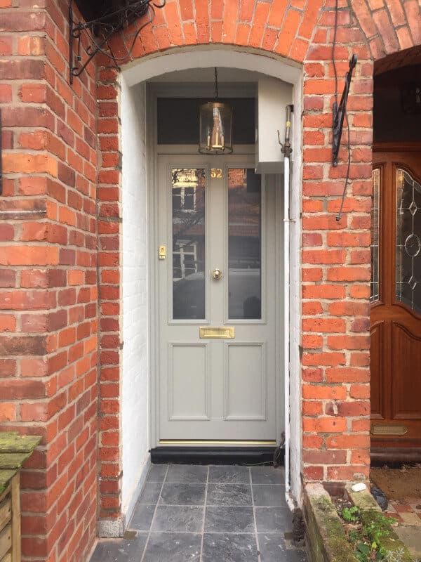 Accoya wood entrance door in lamp room Grey