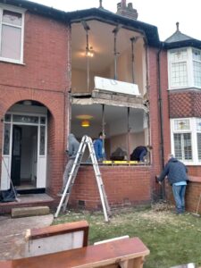 Bay windows being fitted