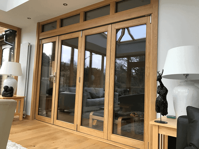 An internal set of Accoya wood bifold doors