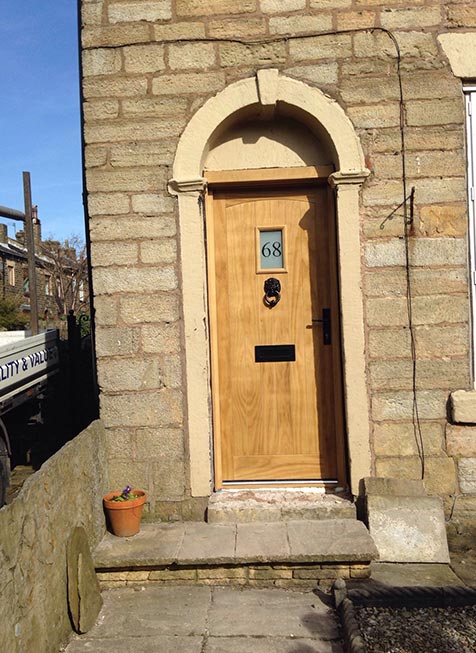Traditional timber oak front door