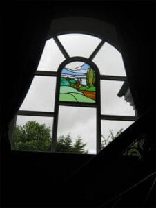 Timber window with stained glass