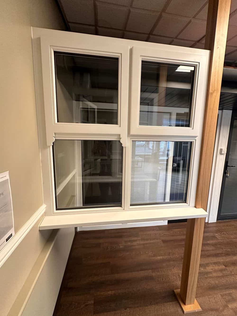 white upvc window shown inside Reddish Joinery showroom